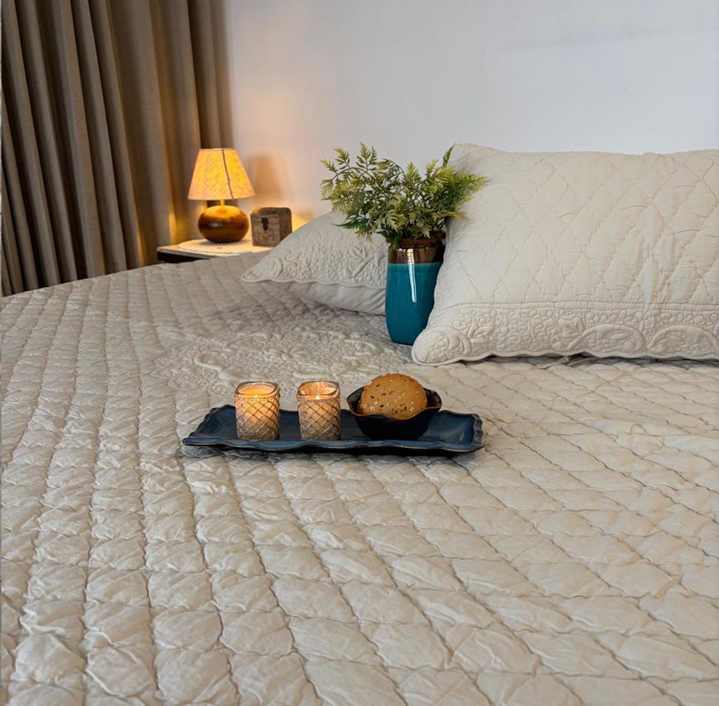 Rajvilasa Ivory Cotton Embossed Quilting Bedspread (2 rectangular cushions - embossed quilting border)